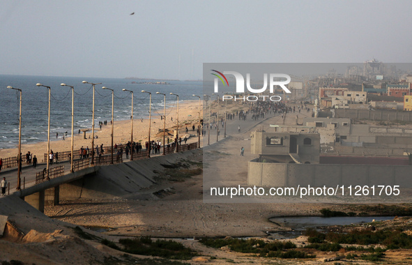 Palestinians are gathering in the hope of obtaining aid delivered into Gaza through a U.S.-built pier, amid the ongoing conflict between Isr...