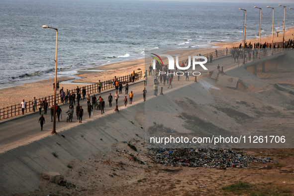 Palestinians are gathering in the hope of obtaining aid delivered into Gaza through a U.S.-built pier, amid the ongoing conflict between Isr...