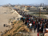 Palestinians are gathering in the hope of obtaining aid delivered into Gaza through a U.S.-built pier, amid the ongoing conflict between Isr...