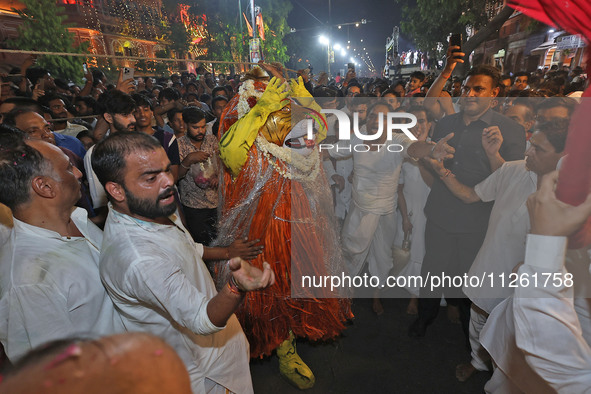 Devotees are participating in the traditional procession 'Narasimha Leela' of Lord Narasimha from Tadkeshwar Mahadev Temple on the eve of Na...