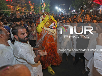 Devotees are participating in the traditional procession 'Narasimha Leela' of Lord Narasimha from Tadkeshwar Mahadev Temple on the eve of Na...