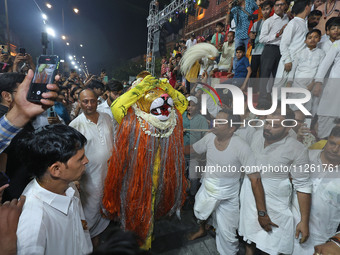 Devotees are participating in the traditional procession 'Narasimha Leela' of Lord Narasimha from Tadkeshwar Mahadev Temple on the eve of Na...