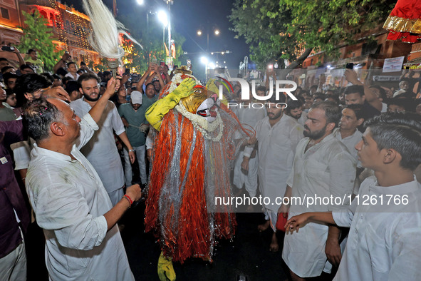 Devotees are participating in the traditional procession 'Narasimha Leela' of Lord Narasimha from Tadkeshwar Mahadev Temple on the eve of Na...