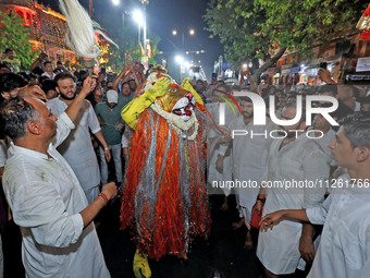 Devotees are participating in the traditional procession 'Narasimha Leela' of Lord Narasimha from Tadkeshwar Mahadev Temple on the eve of Na...