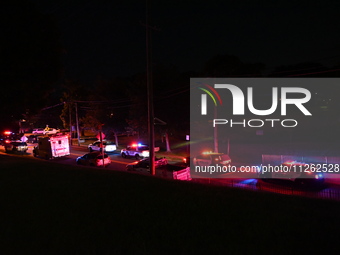 Police are lining the street. One person is wounded in a shooting in Glen Rock, New Jersey, United States, on May 21, 2024. The Bergen Count...