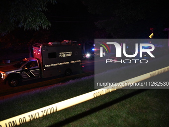 Police tape is blocking the area at the crime scene. One person is wounded in a shooting in Glen Rock, New Jersey, United States, on May 21,...