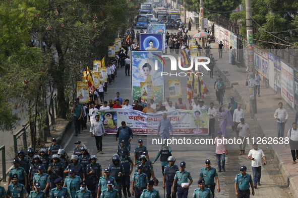 Buddhist people are taking part in a rally on the occasion of the Buddha Purnima festival, which marks the birth of Gautam Buddha, in Dhaka,...