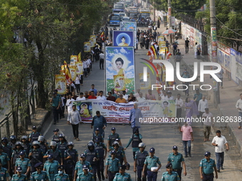 Buddhist people are taking part in a rally on the occasion of the Buddha Purnima festival, which marks the birth of Gautam Buddha, in Dhaka,...