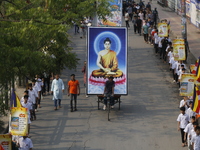 Buddhist people are taking part in a rally on the occasion of the Buddha Purnima festival, which marks the birth of Gautam Buddha, in Dhaka,...