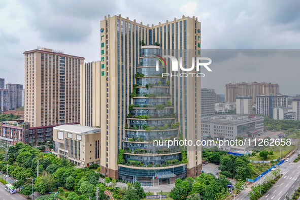 A 12-storey building in Nanning, China, on May 21, 2024, is looking like layers of stacked cakes. Because of the various green vegetation pl...