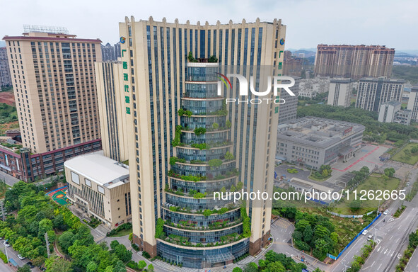 A 12-storey building in Nanning, China, on May 21, 2024, is looking like layers of stacked cakes. Because of the various green vegetation pl...