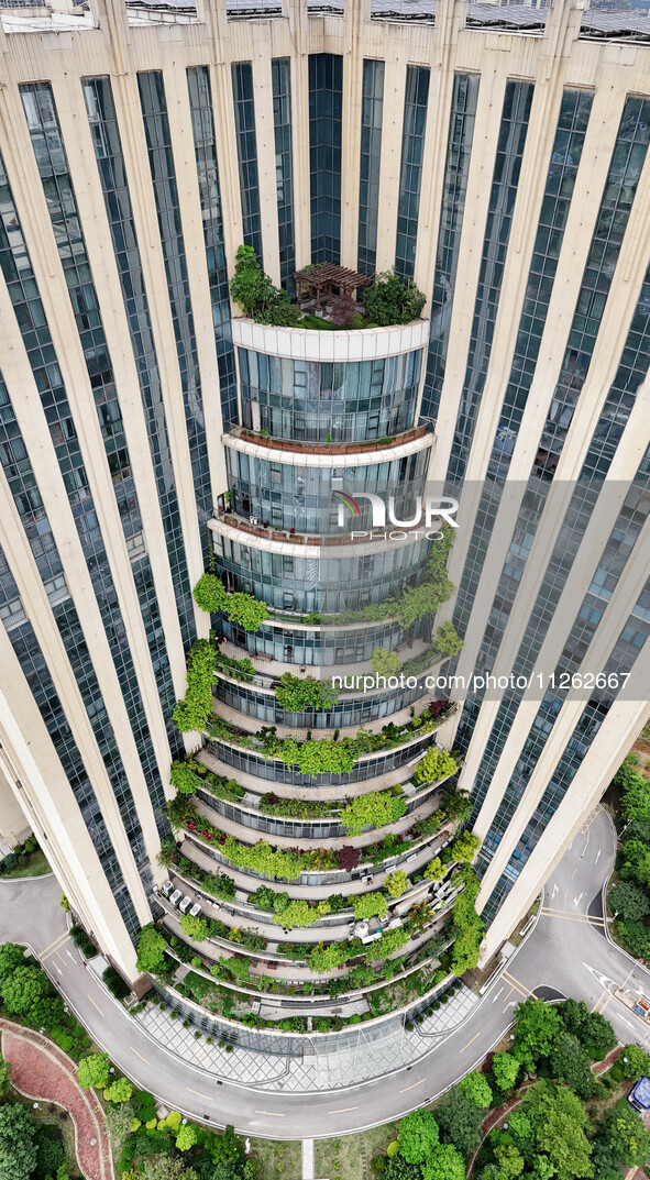 A 12-storey building in Nanning, China, on May 21, 2024, is looking like layers of stacked cakes. Because of the various green vegetation pl...