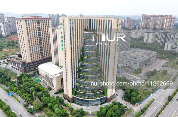 A 12-storey building in Nanning, China, on May 21, 2024, is looking like layers of stacked cakes. Because of the various green vegetation pl...