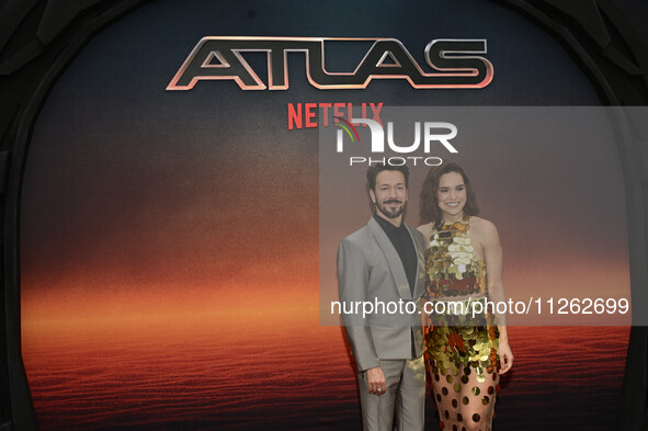 Roger Gonzalez and Tania Rincon are attending the red carpet of the Atlas fan event at Toreo Parque Central in Mexico City, Mexico, on May 2...