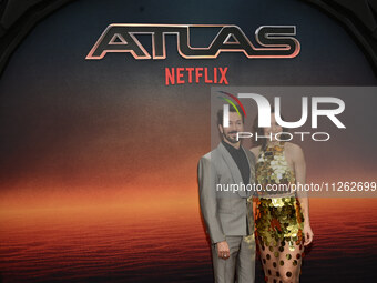 Roger Gonzalez and Tania Rincon are attending the red carpet of the Atlas fan event at Toreo Parque Central in Mexico City, Mexico, on May 2...