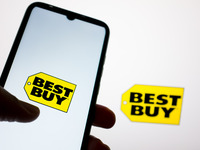 The Best Buy logo is being displayed on a smartphone screen and on a computer screen in Athens, Greece, on May 22, 2024. (