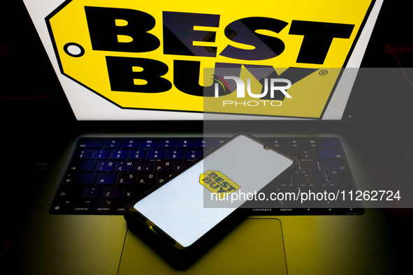 The Best Buy logo is being displayed on a smartphone screen and on a computer screen in Athens, Greece, on May 22, 2024. 