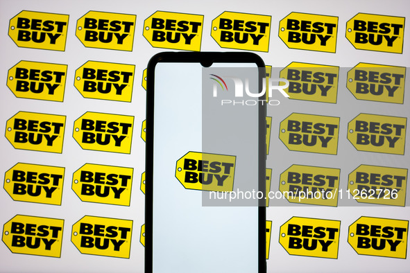 The Best Buy logos are being displayed on a smartphone screen and on a computer screen in Athens, Greece, on May 22, 2024. 