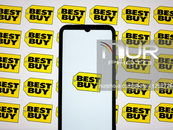 The Best Buy logos are being displayed on a smartphone screen and on a computer screen in Athens, Greece, on May 22, 2024. (