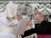 Winds are moving Pope Francis' pellegrina as he is leading his weekly General Audience in Saint Peter's Square, Vatican City, on May 22, 202...