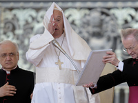 Winds are moving Pope Francis' pellegrina as he is leading his weekly General Audience in Saint Peter's Square, Vatican City, on May 22, 202...