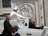 Pope Francis is leaving St. Peter's Square at the end of his weekly general audience in Vatican City, on May 22, 2024. (