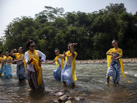 Dancers are performing a traditional dance during the Fang Sen ritual, or releasing animals into nature, as part of a series of worship ahea...