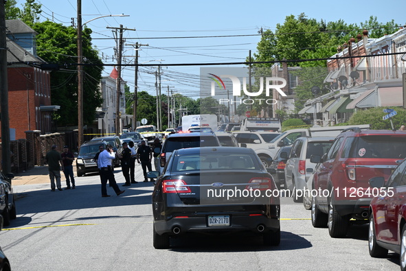 Police are gathering at the crime scene. Two people are dying, and three people are getting injured in a workplace shooting at Delaware Coun...