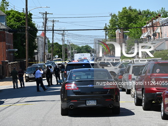 Police are gathering at the crime scene. Two people are dying, and three people are getting injured in a workplace shooting at Delaware Coun...