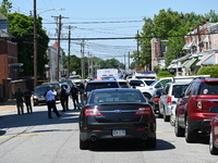 Police are gathering at the crime scene. Two people are dying, and three people are getting injured in a workplace shooting at Delaware Coun...