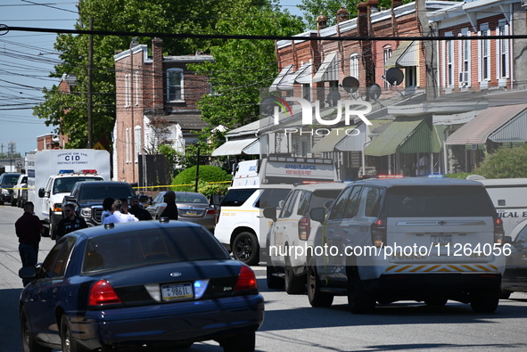 Police are gathering at the crime scene. Two people are dying, and three people are getting injured in a workplace shooting at Delaware Coun...