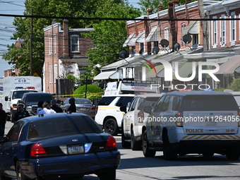 Police are gathering at the crime scene. Two people are dying, and three people are getting injured in a workplace shooting at Delaware Coun...