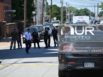 Police are gathering at the crime scene. Two people are dying, and three people are getting injured in a workplace shooting at Delaware Coun...