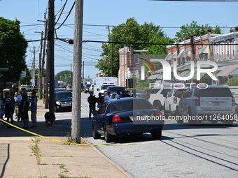 Police are gathering at the crime scene. Two people are dying, and three people are getting injured in a workplace shooting at Delaware Coun...