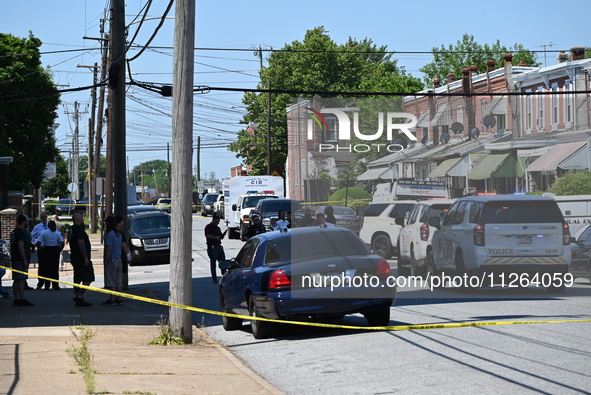 Police are gathering at the crime scene. Two people are dying, and three people are getting injured in a workplace shooting at Delaware Coun...