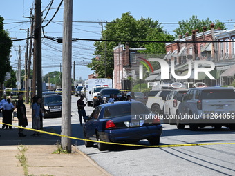 Police are gathering at the crime scene. Two people are dying, and three people are getting injured in a workplace shooting at Delaware Coun...