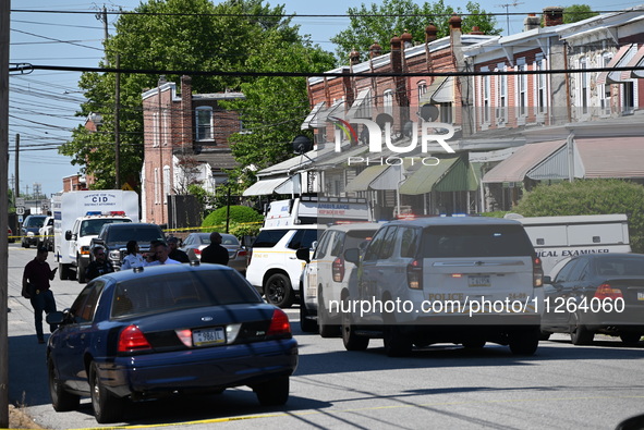 Police are gathering at the crime scene. Two people are dying, and three people are getting injured in a workplace shooting at Delaware Coun...