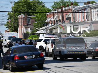 Police are gathering at the crime scene. Two people are dying, and three people are getting injured in a workplace shooting at Delaware Coun...