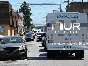 The crime scene unit is gathering at the scene of the workplace mass shooting that is leaving two dead and three injured. Police are gatheri...