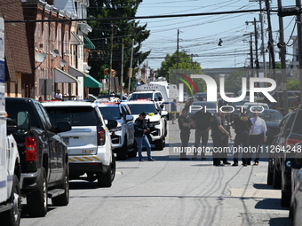 The crime scene unit is gathering at the scene of the workplace mass shooting that is leaving two dead and three injured. Police are gatheri...