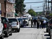 The crime scene unit is gathering at the scene of the workplace mass shooting that is leaving two dead and three injured. Police are gatheri...