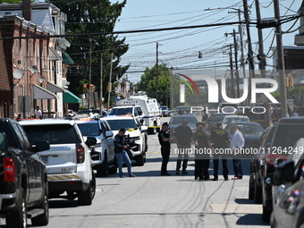 The crime scene unit is gathering at the scene of the workplace mass shooting that is leaving two dead and three injured. Police are gatheri...