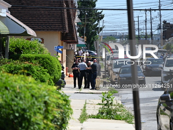 The crime scene unit is gathering at the scene of the workplace mass shooting that is leaving two dead and three injured. Police are gatheri...