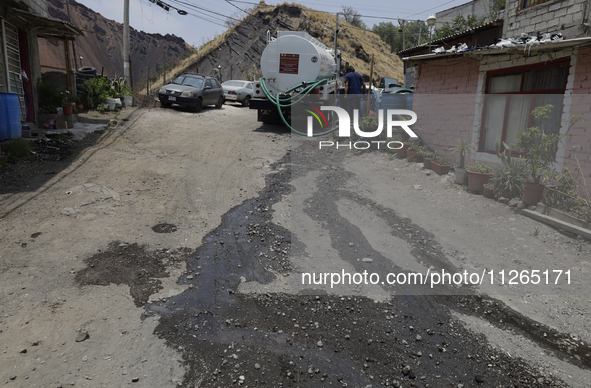 The water is being distributed by means of a water pipe for homes inside the property known as El Yuguelito, an irregular terrain located in...