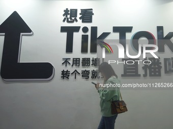 TikTok's booth is being displayed at an exhibition in Hangzhou, Zhejiang province, China, on November 23, 2023. TikTok is issuing a notice t...