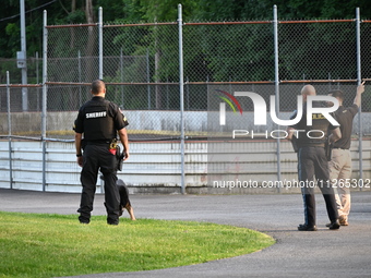 Wilde Memorial Park is remaining closed in Glen Rock, New Jersey, United States, on May 22, 2024, following a shooting. Police tape, police...