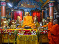 Indian Buddhist monks are decorating a statue of Lord Buddha at a monastery on the occasion of Buddha Purnima in Kolkata, India, on May 23,...