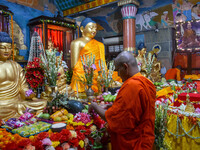 Indian Buddhist monks are decorating a statue of Lord Buddha at a monastery on the occasion of Buddha Purnima in Kolkata, India, on May 23,...