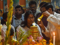 People are offering prayers to a relic of Gautam Buddha, which contains the remains of Buddha, at a monastery in Kolkata, India, on May 23,...