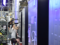 Workers are assembling refrigerators at the LG Refrigerator production base in Taizhou, China, on May 23, 2024. This is LG's largest refrige...